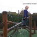 family daughter on climbing frame