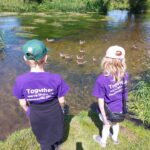 children and ducks